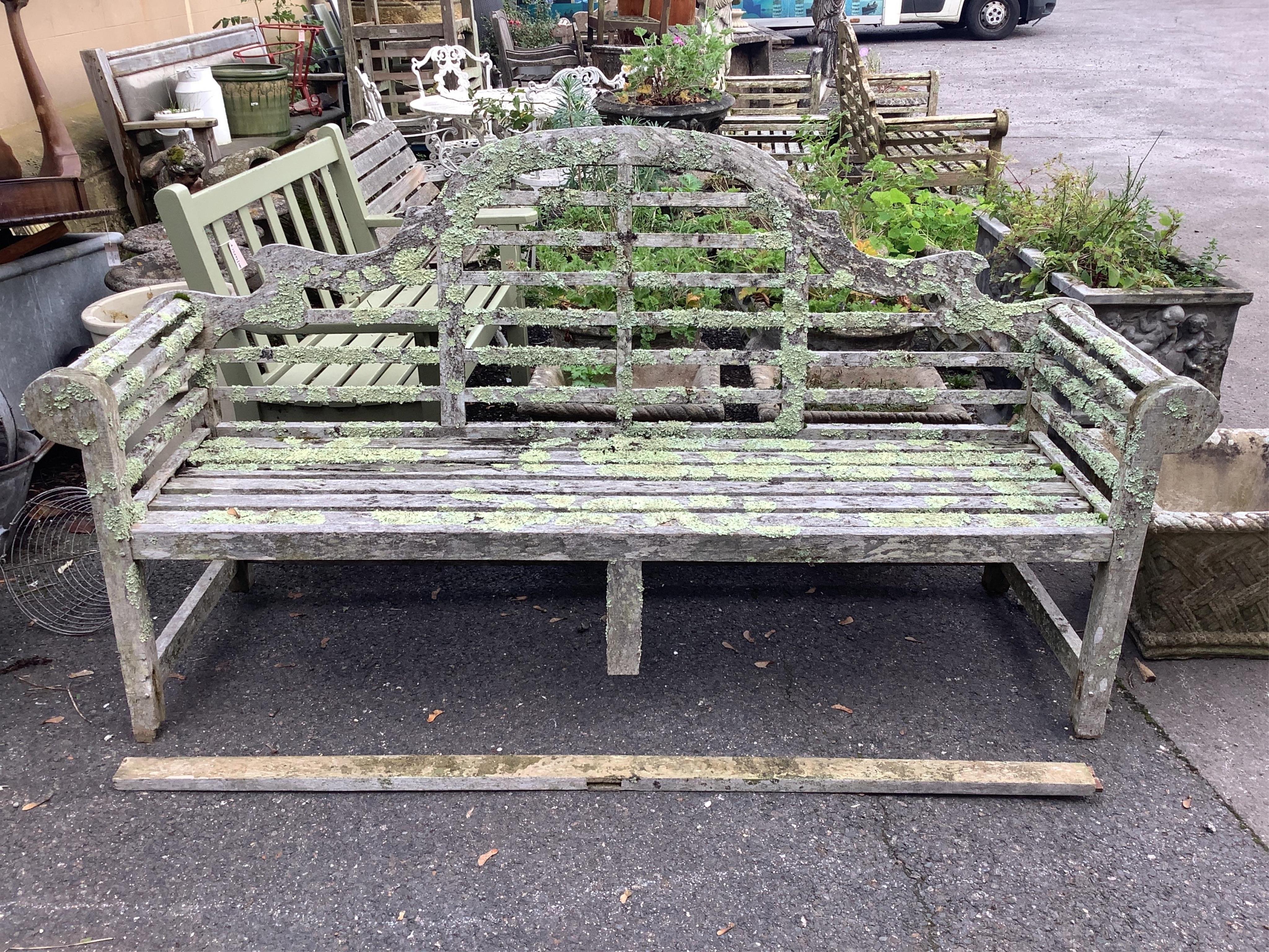 Three weathered teak Lutyens style garden benches, width 196cm, depth 57cm, height 104cm. Condition - poor, covered in lichen